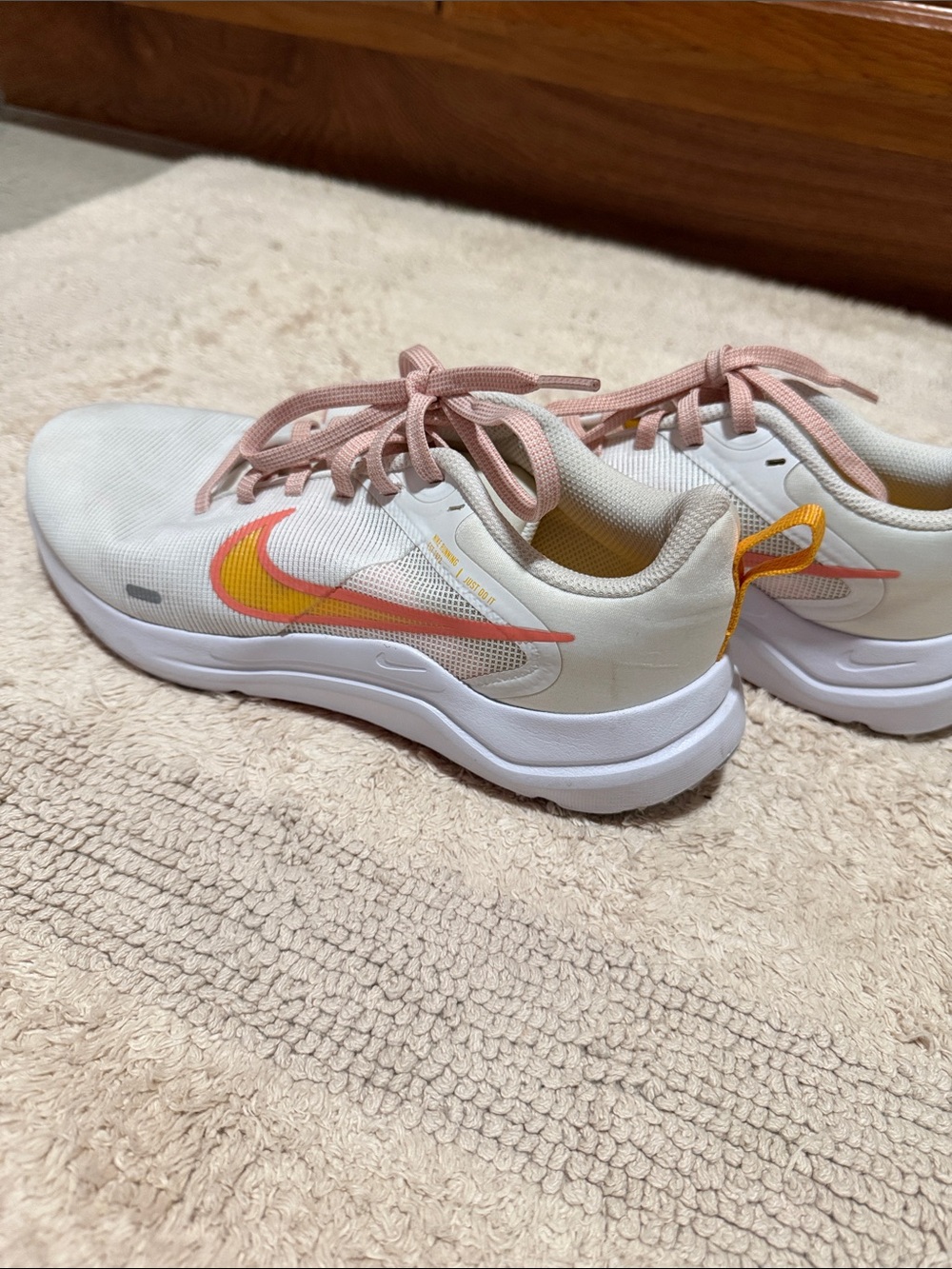Nike Women’s White/Pink Sneakers with Yellow & Coral Swoosh